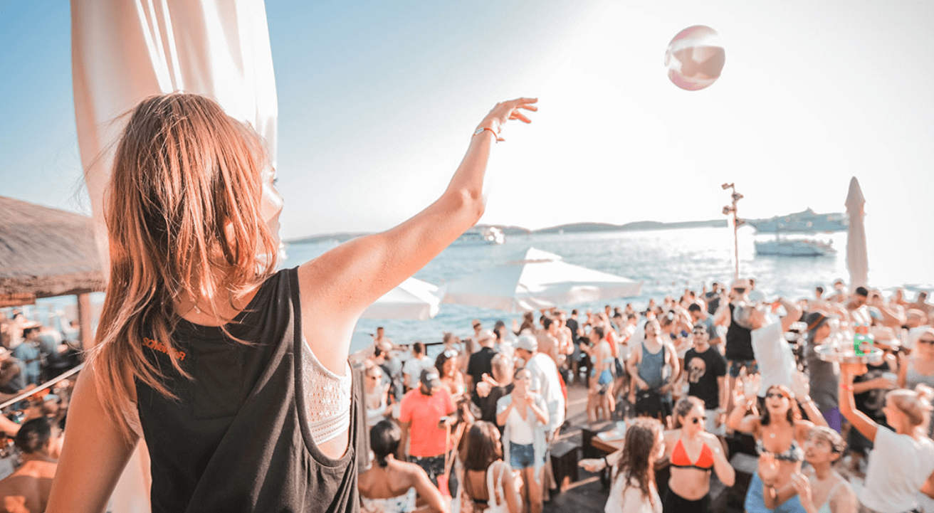 Hula Hula Beach Bar Hvar sunset party crowd dancing cocktails