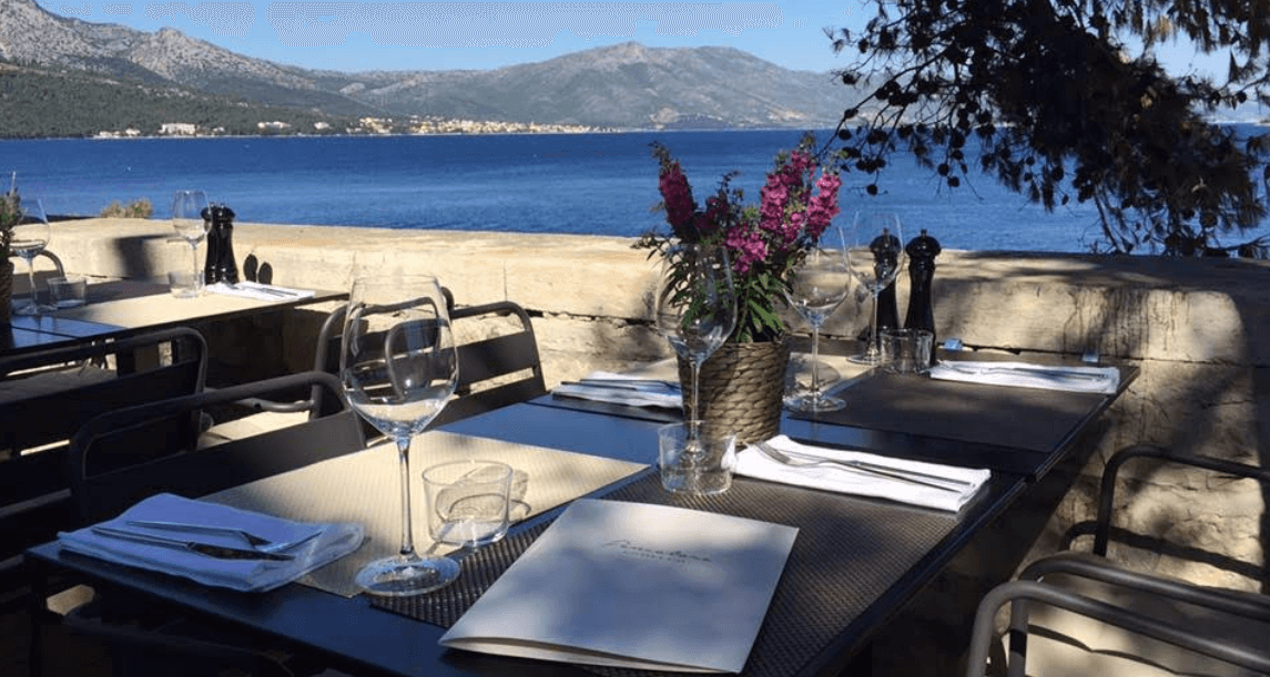 Seaside restaurant terrace in Korčula Croatia overlooking the Adriatic Sea