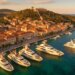 aerial view of Hvar Town harbor at golden hour